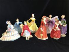 Eight Royal Doulton figures to include Florence, Ninette, Isadora, Christmas Morn, Julia, Sally,