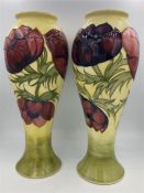 A Pair of Moorcroft 28cm tall vases with purple flowers