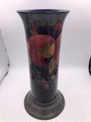 An Moorcroft vase with pewter base made by Wotton of Sheffield, pomegranate pattern (1947-53)