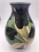 A Moorcroft tulip themed vase M/2176