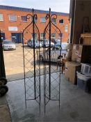 A pair of 6' folding lattice garden spires.