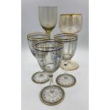 Josephinen Hutte Art Nouveau glasses, three enamelled and gilt designed by Siegfried Haertel and two