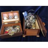 Two Jewellery boxes containing a volume of costume jewellery.