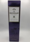 A bottle of 18 year old Macallan single malt Scotch Whisky.