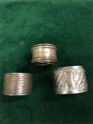 Three hallmarked silver napkin rings