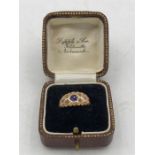 A 9ct yellow gold sapphire and diamond ring (2g)