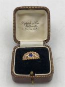 A 9ct yellow gold sapphire and diamond ring (2g)