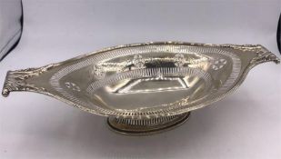 A hallmarked silver pierced bowl, for Dupree & Young Ltd of Exeter. 1907-08