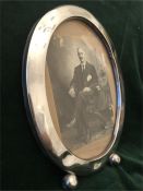 A silver Oval picture frame