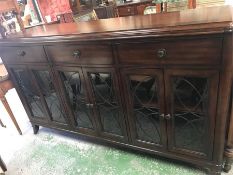 A Large sideboard with glazed doors