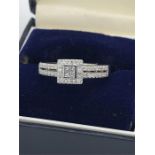 An 18ct white gold and diamond ring