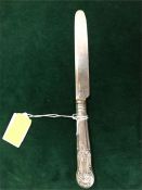 A silver handled Georgian dessert knife dated 1789.