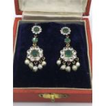 A boxed set of costume earrings made in India.