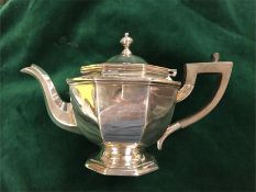 A silver teapot by Mappin Webb, hallmarked Sheffield 1917-18