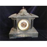 A slate clock with key