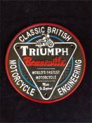 A Cast Iron Triumph Bonneville sign