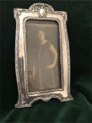 A silver picture frame, hallmarked Birmingham 1911.