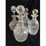 Four cut glass decanters