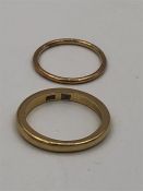 Two Asian gold wedding rings (4.4g)