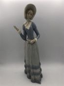 A tall Lladro lady, without parasol.