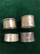 A selection of four hallmarked silver napkin rings