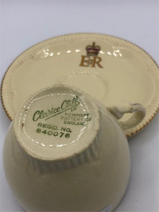 A 1952 Queen Elizabeth II Coronation cup and saucer by Clarice Cliff Newport Pottery - Image 2 of 2