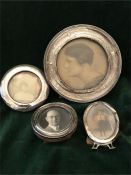 Four assorted hallmarked silver picture frames.