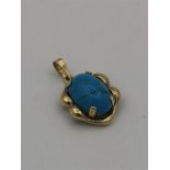 A 14ct yellow gold pendant with blue agate stone