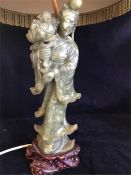 A soapstone Oriental goddess lamp base.