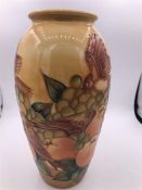 A Moorcroft 25cm vase M/1584 Bird themed vase.