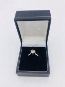 A 14ct white gold brilliant cut single stone diamond ring of 1ct.