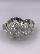 A silver pin tray with pierced design by CB & S, hallmarked Sheffield 1923.