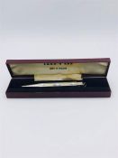 A boxed silver pen, marked Sterling Silver