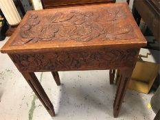 An Arts And Crafts carved sewing box