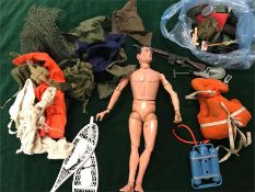 A selection of 1970's Vintage Action Man clothes and a single Action Man.