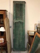 A single green Vintage louvre door
