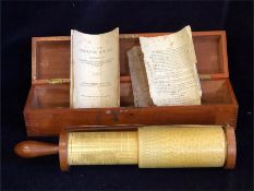 A Fuller's Calculating slide Rule in box with original paperwork