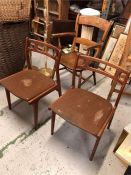 A pair of Mid Century Teak Danish chairs, see photo for Manufacturers Label.