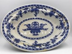 A Blue and White Delft platter with staples AF