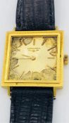 A Vintage Longines gold square faced Gents watch with no glass to face.