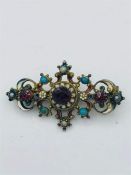 A small Ladies brooch