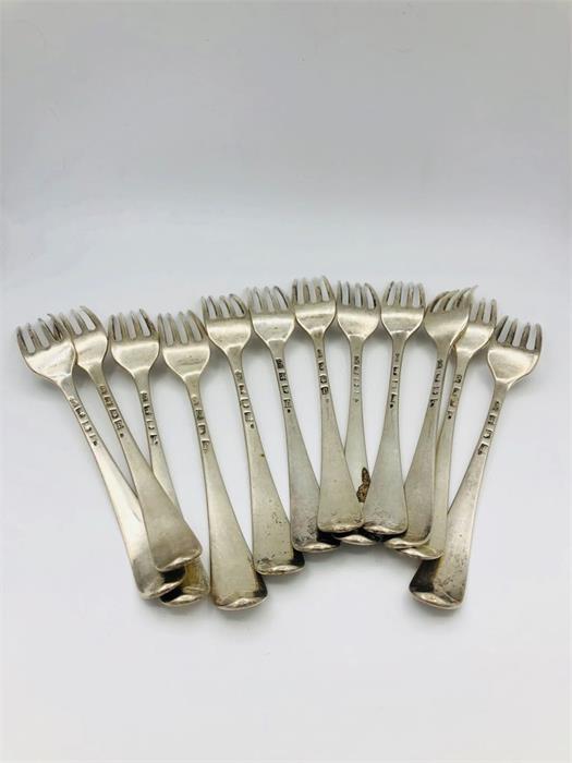 A set of twelve table forks, dated 1742, makers mark HB possibly Henry Bailey. (681g) - Image 2 of 6
