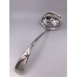 A silver ladle hallmarked Sheffield 1901 by JR