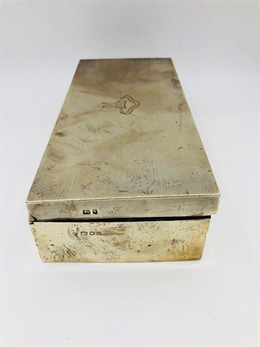 A Cigarette box in silver with a machine tooled finish, crest with a Waste Not motto, makers mark - Image 2 of 5