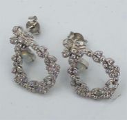 A pair of CZ and Opal Set Earrings