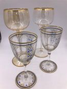 Josephinen Hutte Art Nouveau glasses, a pair of enamelled and gilt deigned by Siegfried Haertel