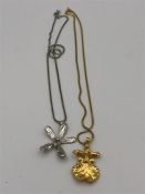 Two necklaces with dipped Orchid pendants in silver and gold.