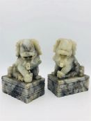 A pair of Foo Dog book ends in soapstone.