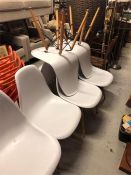 A set of white and beech wood chairs