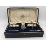 A cased cruet silver cruet set for James Hardy Ltd, hallmarked Birmingham.